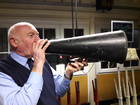 Signalman, Paul Kenny, demonstrates LMS loud hailer